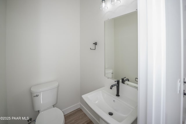 6881 E Bourbon Way, Prescott Valley, AZ 86315 - bathroom featuring toilet and wood finished floors