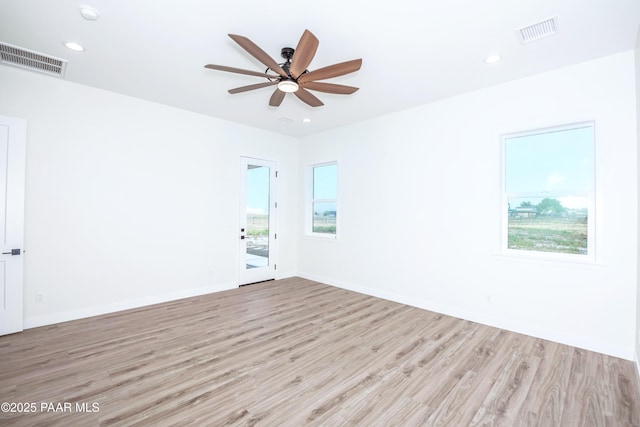 6881 E Bourbon Way, Prescott Valley, AZ 86315 - unfurnished room with wood finished floors, ceiling fan, a smoke detector, and recessed lighting