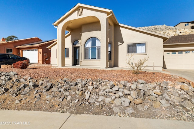 view of front of home featuring a garage