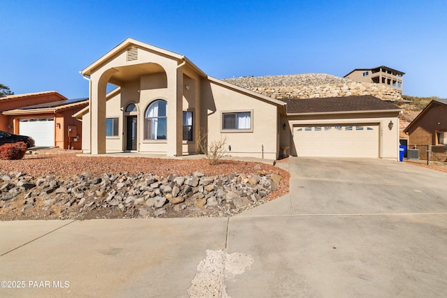 view of front of property featuring a garage