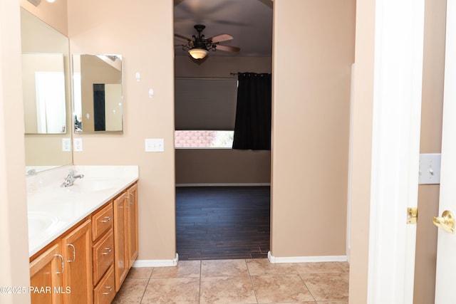 6265 E Distant View Ct, Cornville, AZ 86325 - bathroom featuring a ceiling fan and double vanity