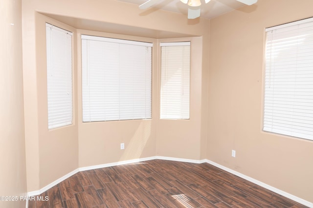 6265 E Distant View Ct, Cornville, AZ 86325 - unfurnished room with dark wood-style floors and a ceiling fan