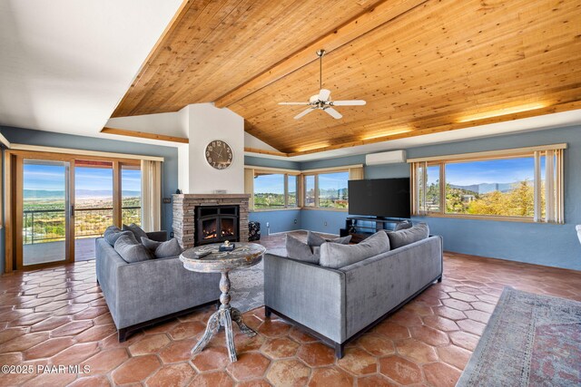 living room with a warm lit fireplace, wood ceiling, vaulted ceiling, a wall mounted AC, and a ceiling fan