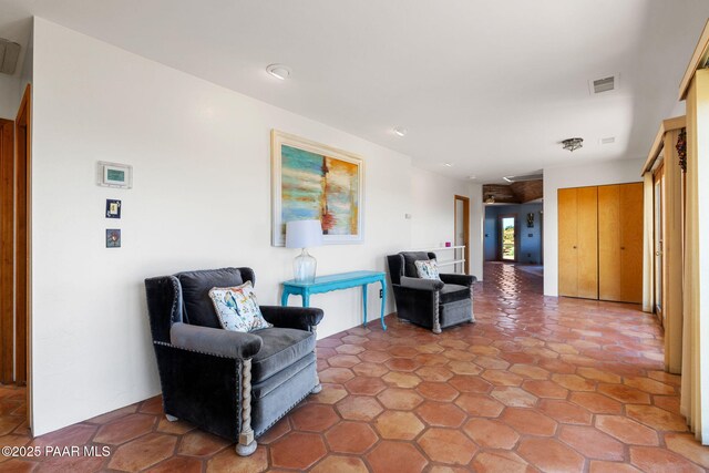 sitting room with visible vents