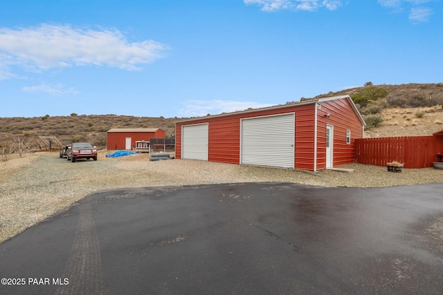 detached garage with fence