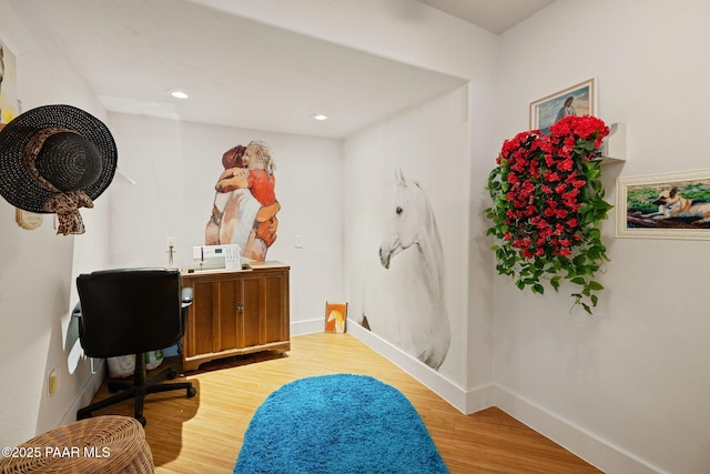 office featuring recessed lighting, wood finished floors, and baseboards