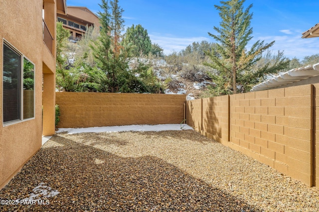 view of yard featuring a fenced backyard