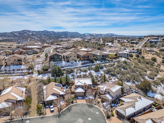 birds eye view of property with a residential view and a mountain view