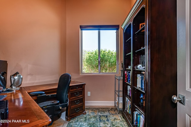 home office featuring tile patterned flooring