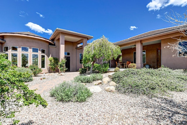 exterior space featuring stucco siding