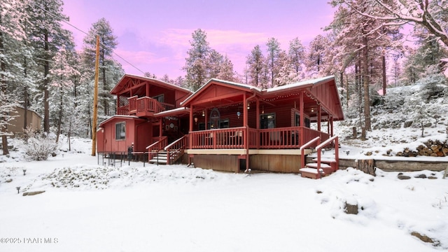 view of snow covered property