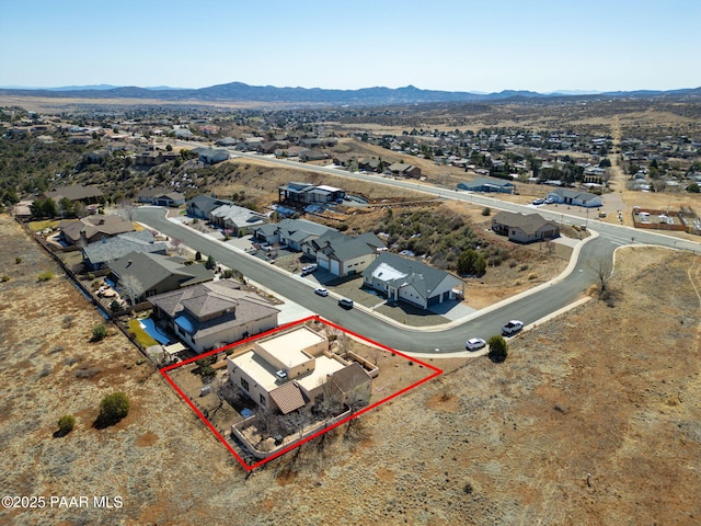 aerial view with a mountain view and a residential view