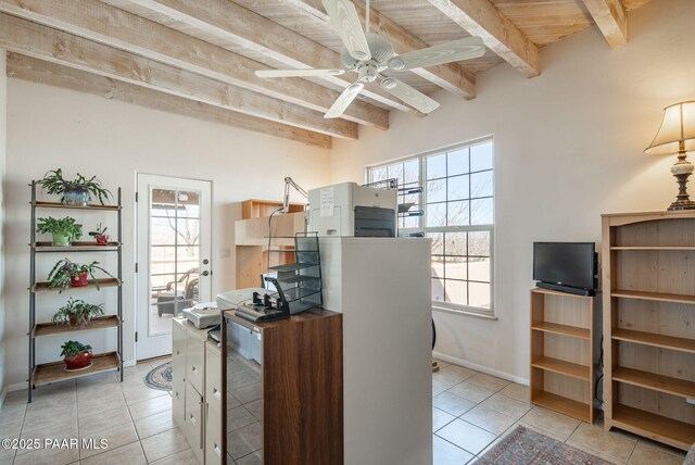 kitchen with ceiling fan, beamed ceiling, and light tile patterned flooring