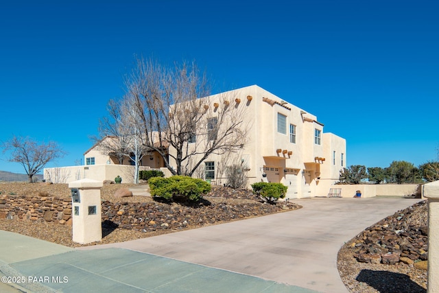 exterior space with stucco siding