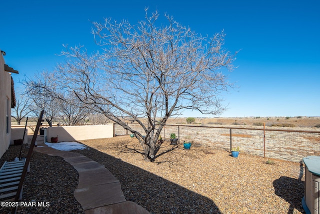 view of yard featuring a fenced backyard