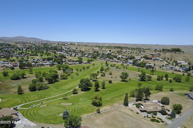 birds eye view of property featuring a residential view, a mountain view, and view of golf course