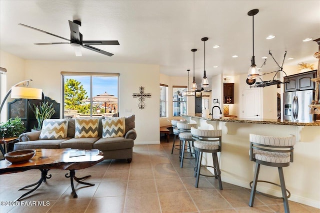 3000 Noble Star Dr, Prescott, AZ 86301 - living area with ceiling fan, baseboards, light tile patterned floors, and recessed lighting