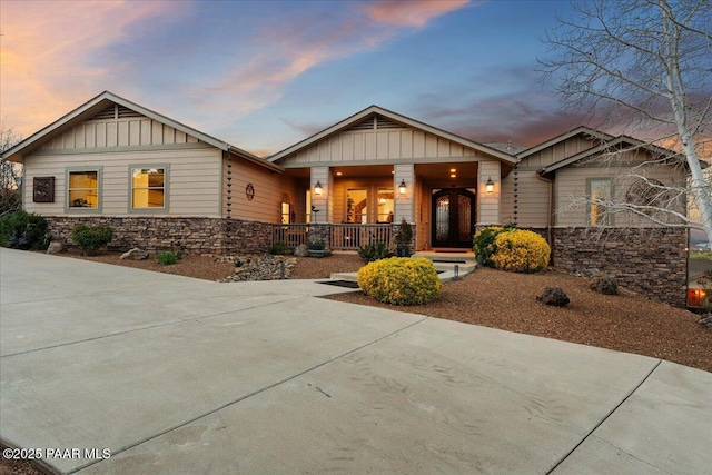 3000 Noble Star Dr, Prescott, AZ 86301 - view of front of house featuring a porch, board and batten siding, and stone siding