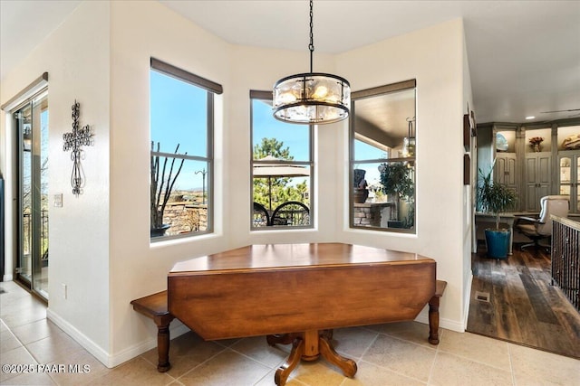 3000 Noble Star Dr, Prescott, AZ 86301 - dining area featuring tile patterned flooring, baseboards, and a notable chandelier