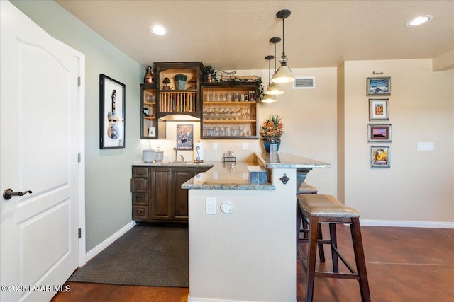 3000 Noble Star Dr, Prescott, AZ 86301 - bar with pendant lighting, indoor wet bar, visible vents, recessed lighting, and baseboards