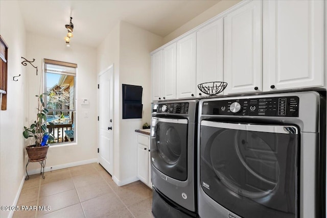 3000 Noble Star Dr, Prescott, AZ 86301 - washroom featuring cabinet space, washing machine and clothes dryer, light tile patterned flooring, and baseboards