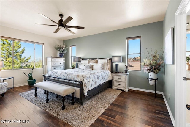 3000 Noble Star Dr, Prescott, AZ 86301 - bedroom featuring dark wood-type flooring, multiple windows, baseboards, and a ceiling fan