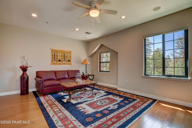 1716 Alpine Meadows Ln Unit 1402, Prescott, AZ 86303 - living area featuring plenty of natural light, wood finished floors, baseboards, and recessed lighting