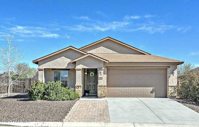 single story home with a garage, driveway, fence, and stucco siding