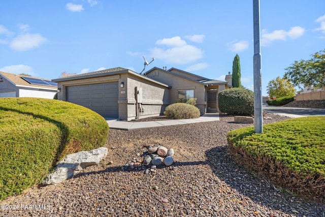 ranch-style house with a garage