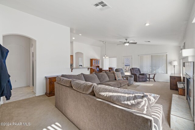 room details with a tile fireplace and carpet floors