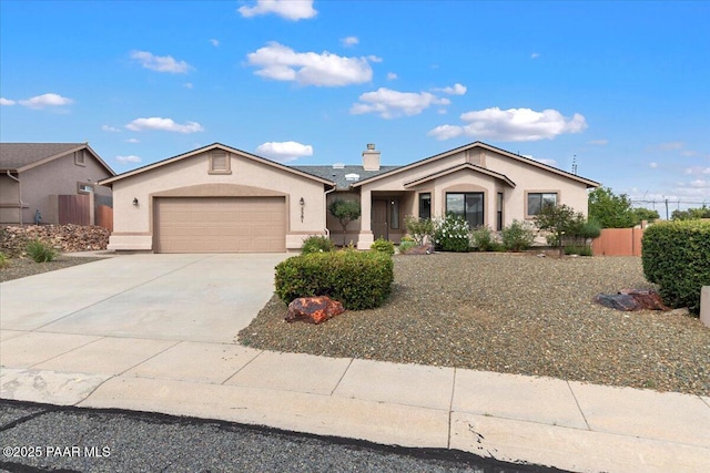 single story home with a garage