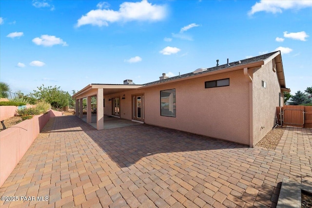 rear view of house with a patio area