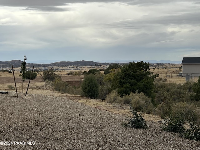 view of mountain feature with a rural view