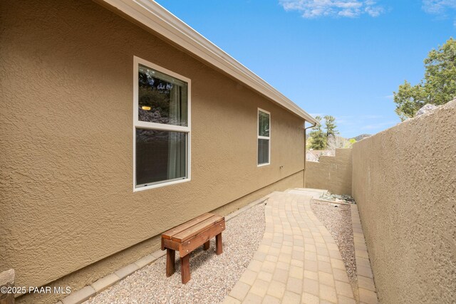 2635 Tolemac Way, Prescott, AZ 86305 - view of property exterior featuring a fenced backyard and stucco siding