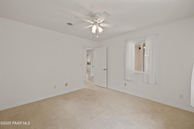 2635 Tolemac Way, Prescott, AZ 86305 - spare room with baseboards, light carpet, and a ceiling fan