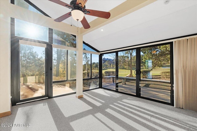 unfurnished sunroom with ceiling fan and plenty of natural light