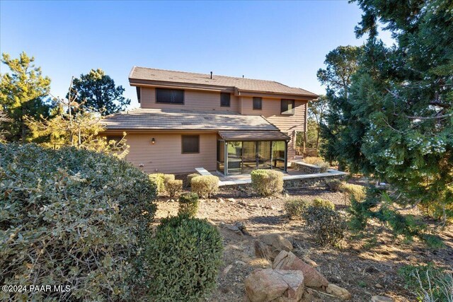 rear view of property with a patio