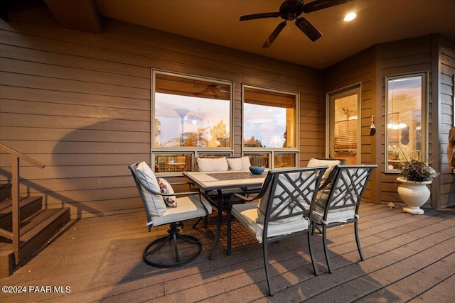 exterior space with ceiling fan