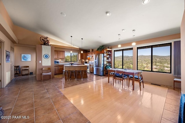 435 Fairway View Dr, Prescott, AZ 86303 - dining space featuring vaulted ceiling, recessed lighting, and light tile patterned floors