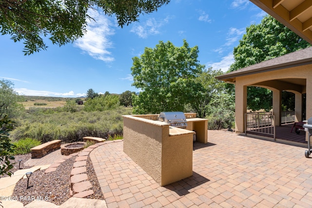 10559 Manzanita Trl, Dewey-Humboldt, AZ 86327 - view of patio / terrace featuring area for grilling, a grill, and an outdoor fire pit