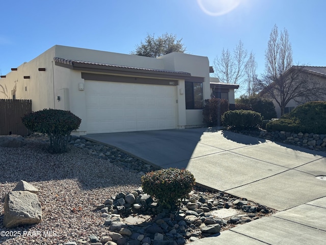 view of side of home featuring a garage