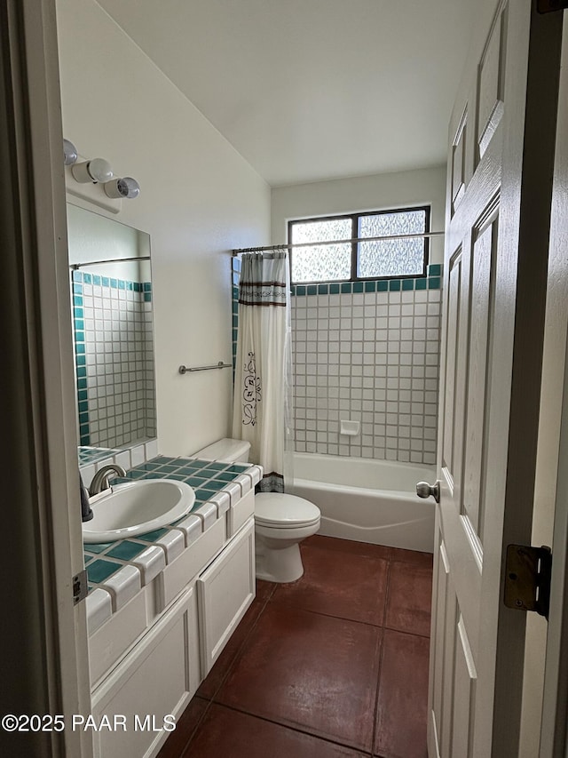 full bathroom with tile patterned floors, shower / bath combination with curtain, toilet, and vanity