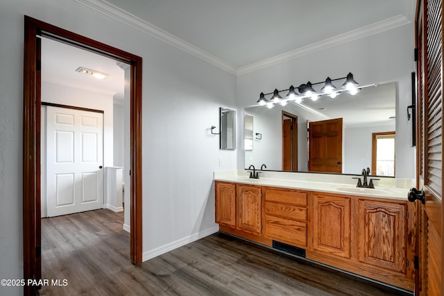 285 E Crestwood, Prescott, AZ 86303 - bathroom with double vanity, crown molding, wood finished floors, and a sink