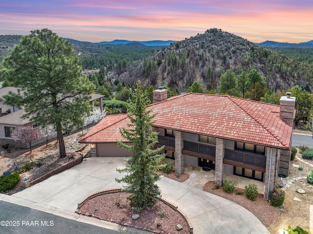 285 E Crestwood, Prescott, AZ 86303 - aerial view at dusk featuring a mountain view and a view of trees