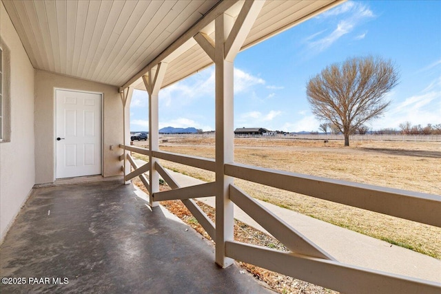 view of patio / terrace featuring a rural view