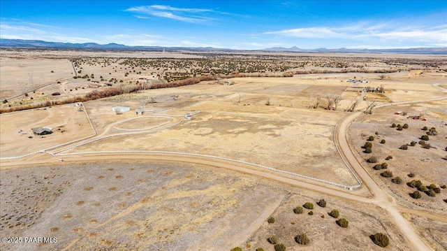 drone / aerial view with a mountain view and a desert view