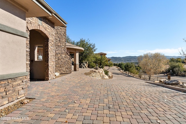 view of patio / terrace with a mountain view