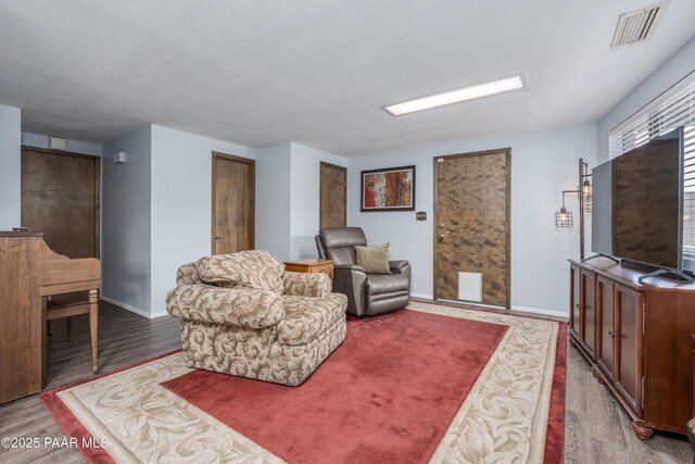 225 Sierra Rd, Sedona, AZ 86336 - living room with wood finished floors and baseboards