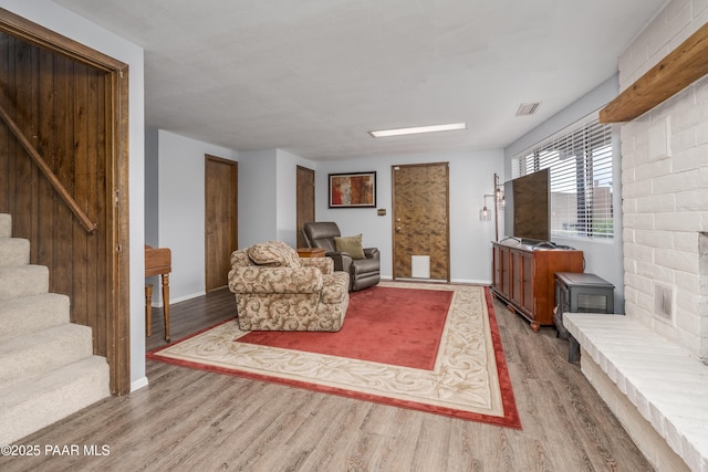 225 Sierra Rd, Sedona, AZ 86336 - living room featuring wood finished floors, stairway, and baseboards