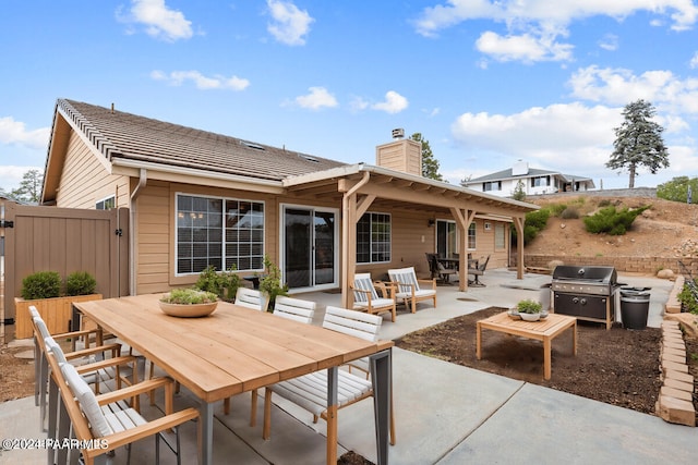 back of property featuring a patio